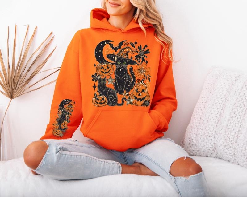 Black Cat With Pumpkins